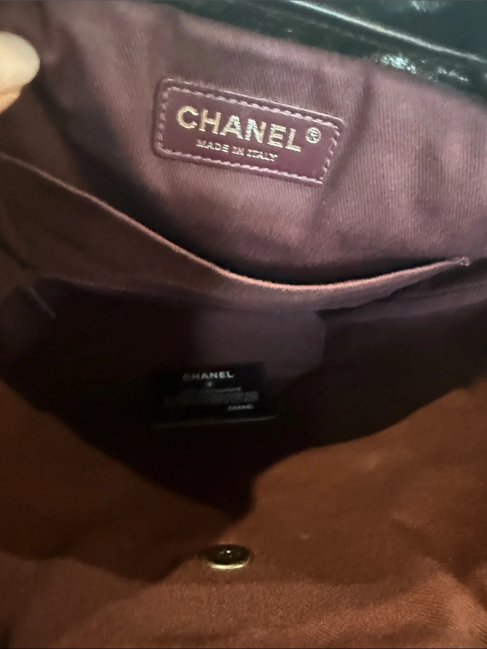 CHANEL Black Quilted Lambskin Drawstring Backpack with Chain